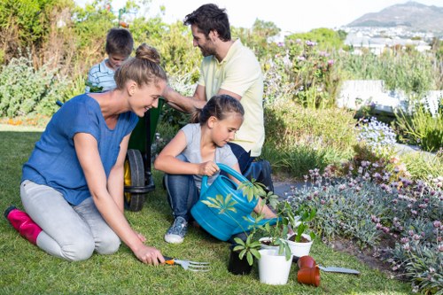 Garden workers removing debris